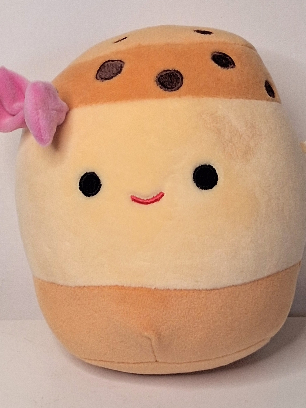 Squishmallows Cream, Tan & Pink Boba Tea Plush with Pink Bow